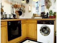 Как выбрать подходящую модель стиральной машины, чтобы встроить ее на кухню