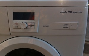Атлант 50С104 - это современная стиральная машина.